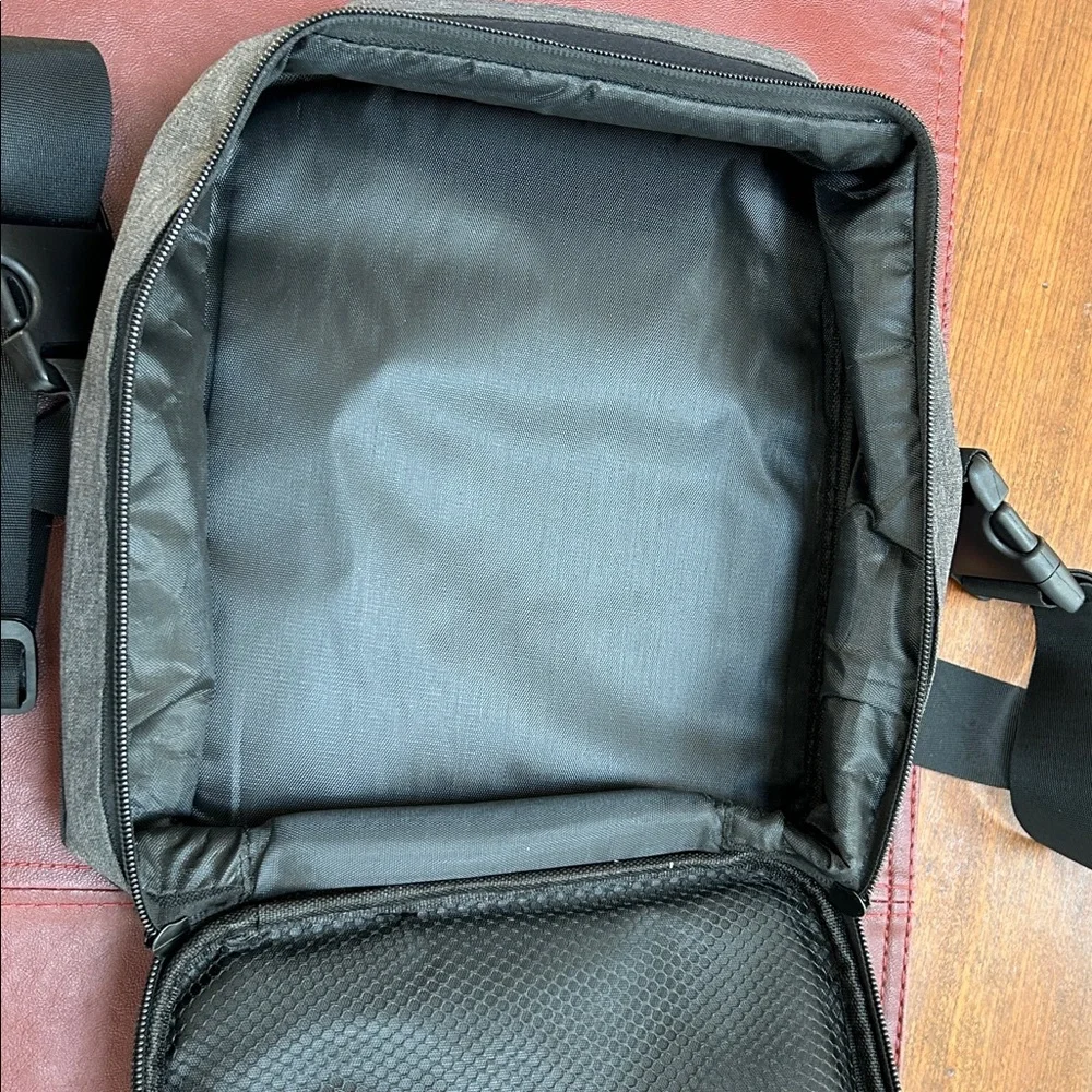 EXO Padded Men's Black Crossbody Bag. Protection for what you carry. 11x8.5”.